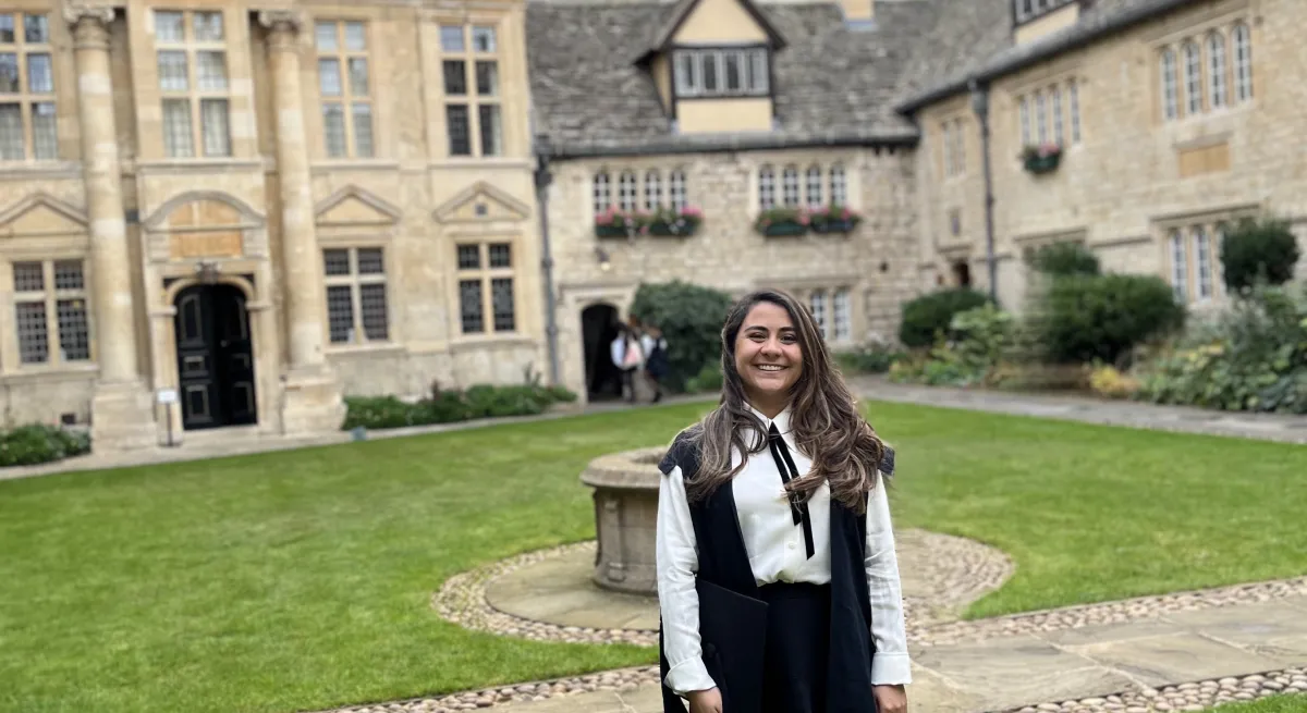 Women standing in front of Oxford building