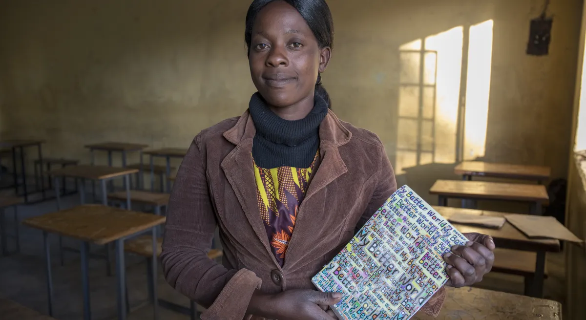 Women with booklet in hands