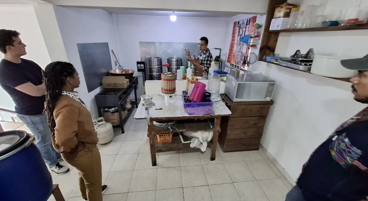 people standing in a kitchen