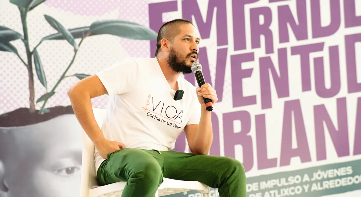 Man sitting on a stage