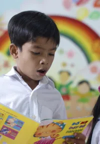 Room to Read Hong Kong Young Boy Reading 