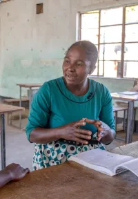 Girls discussing in classroom
